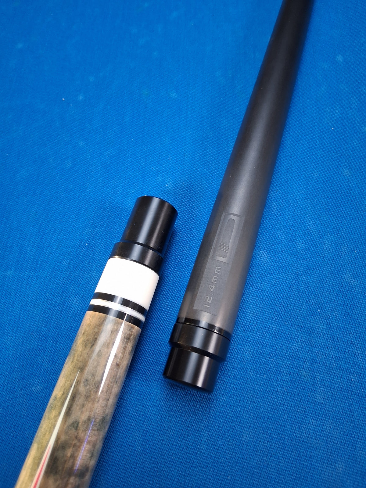 Champion X5-7 cue butt cap and patterned design