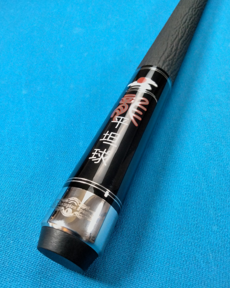 The Champion NDL-2K Dragon 12.4mm Carbon Fiber Uni-Loc Pool Cue